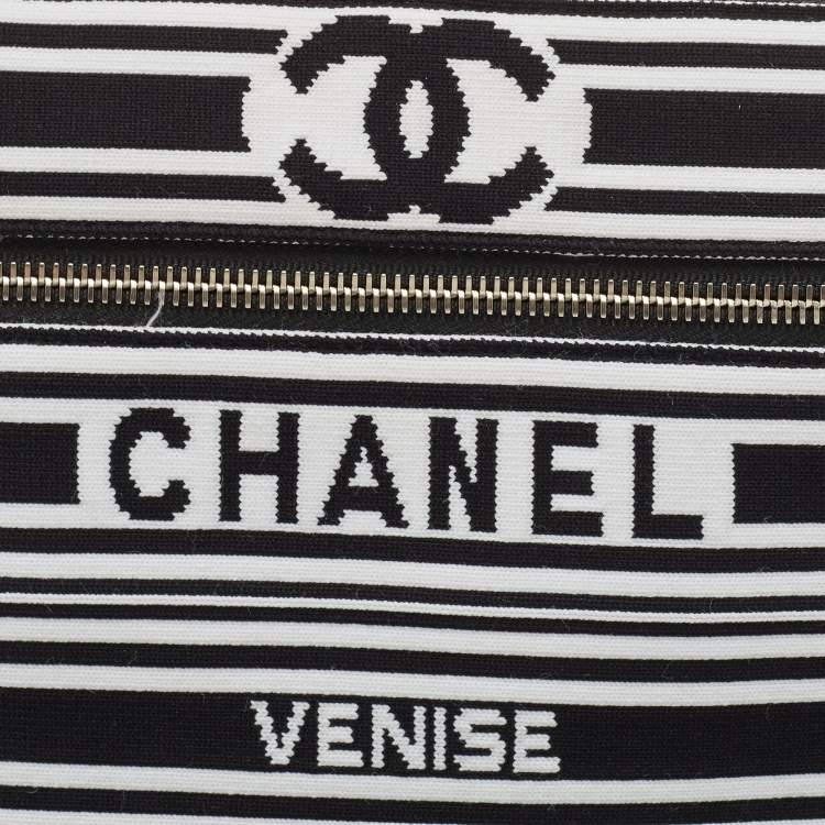 Pre Owned Chanel Black/White Stripe Fabric and Leather Zip Wristlet Clutch
