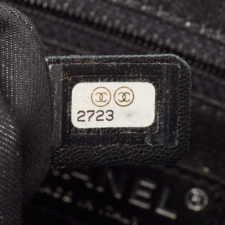 Pre Owned Chanel Black/White Stripe Fabric and Leather Zip Wristlet Clutch