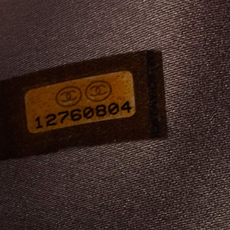 Pre Owned Chanel Metallic Pink Leather Ribbon Embossed Trifold Wallet