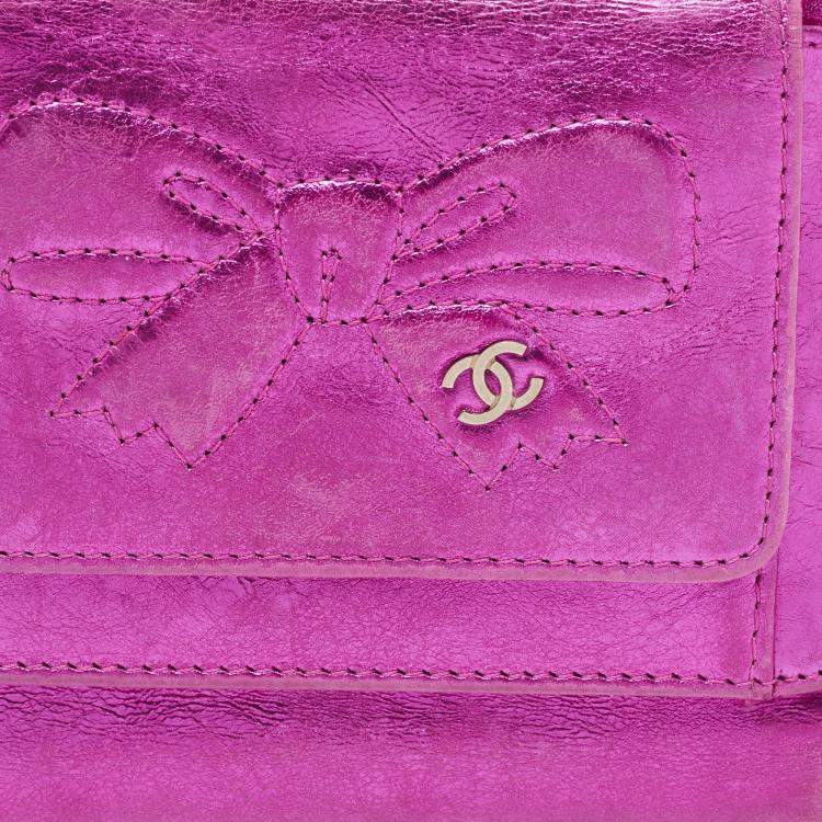 Pre Owned Chanel Metallic Pink Leather Ribbon Embossed Trifold Wallet