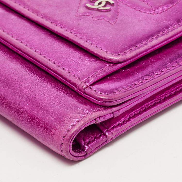 Pre Owned Chanel Metallic Pink Leather Ribbon Embossed Trifold Wallet