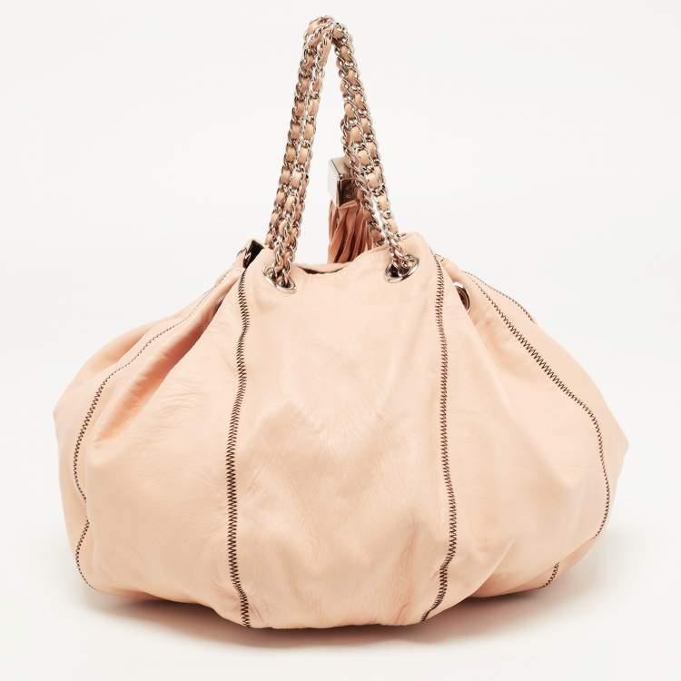 Pre Owned Chanel Peach/Black Leather Reversible Drawstring Tassel Bag