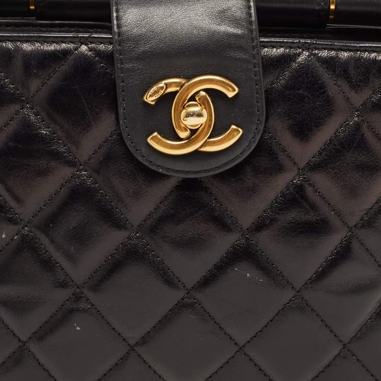 Pre Owned Chanel Black Quilted Leather Gold Bar Top Handle Bag
