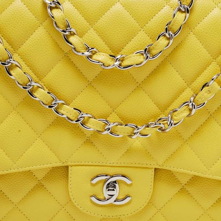 Pre Owned Chanel Yellow Quilted Caviar Leather Maxi Classic Single Flap Bag