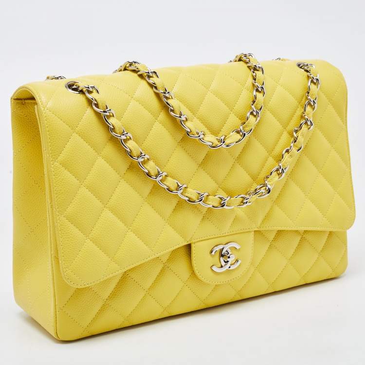 Pre Owned Chanel Yellow Quilted Caviar Leather Maxi Classic Single Flap Bag