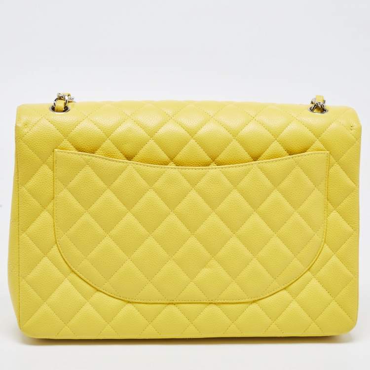 Pre Owned Chanel Yellow Quilted Caviar Leather Maxi Classic Single Flap Bag