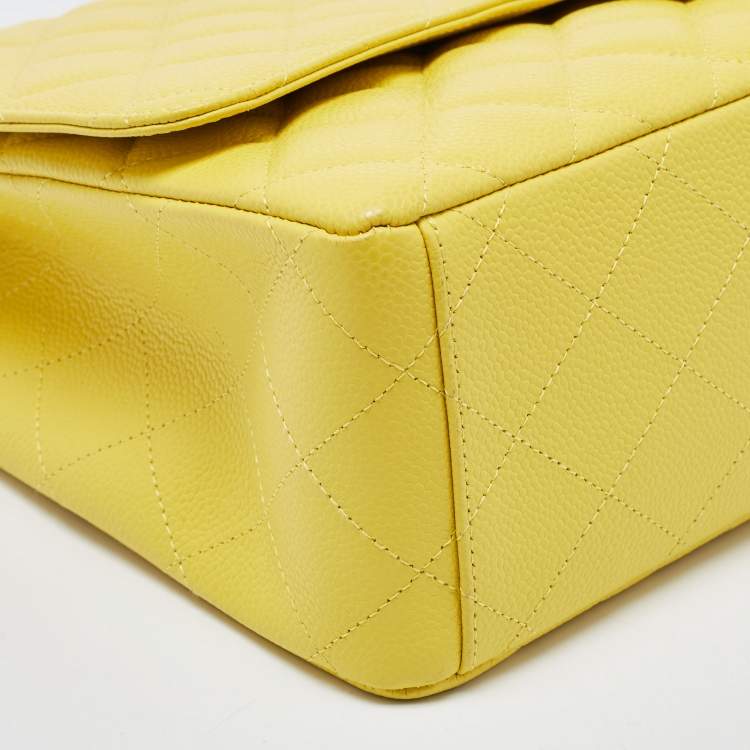 Pre Owned Chanel Yellow Quilted Caviar Leather Maxi Classic Single Flap Bag