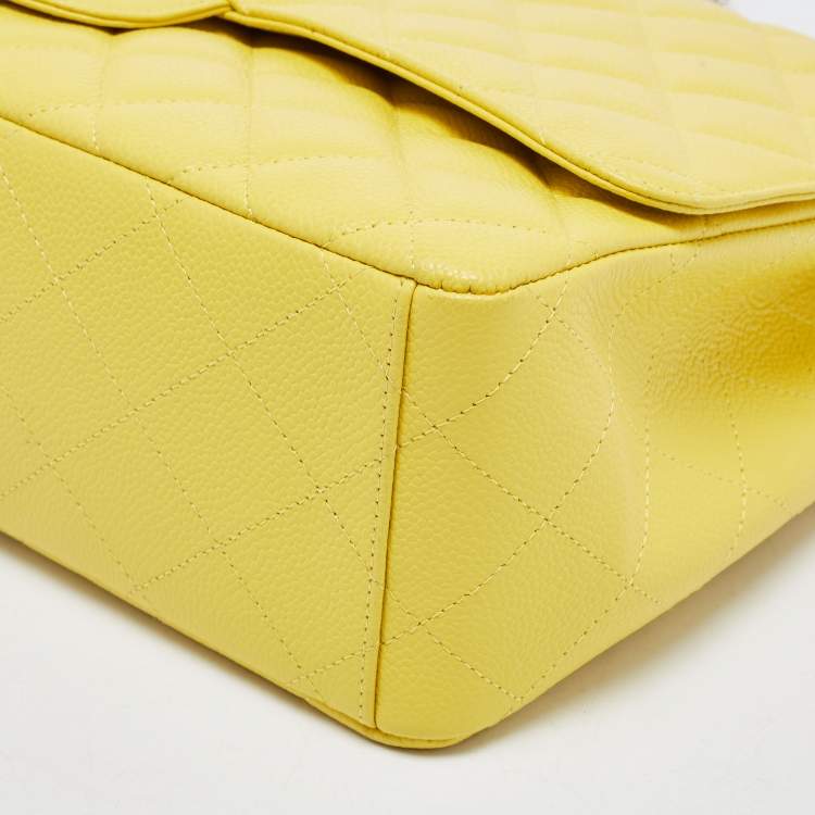 Pre Owned Chanel Yellow Quilted Caviar Leather Maxi Classic Single Flap Bag