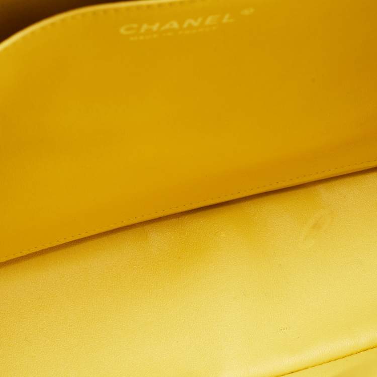 Pre Owned Chanel Yellow Quilted Caviar Leather Maxi Classic Single Flap Bag