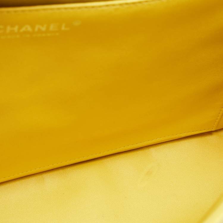 Pre Owned Chanel Yellow Quilted Caviar Leather Maxi Classic Single Flap Bag