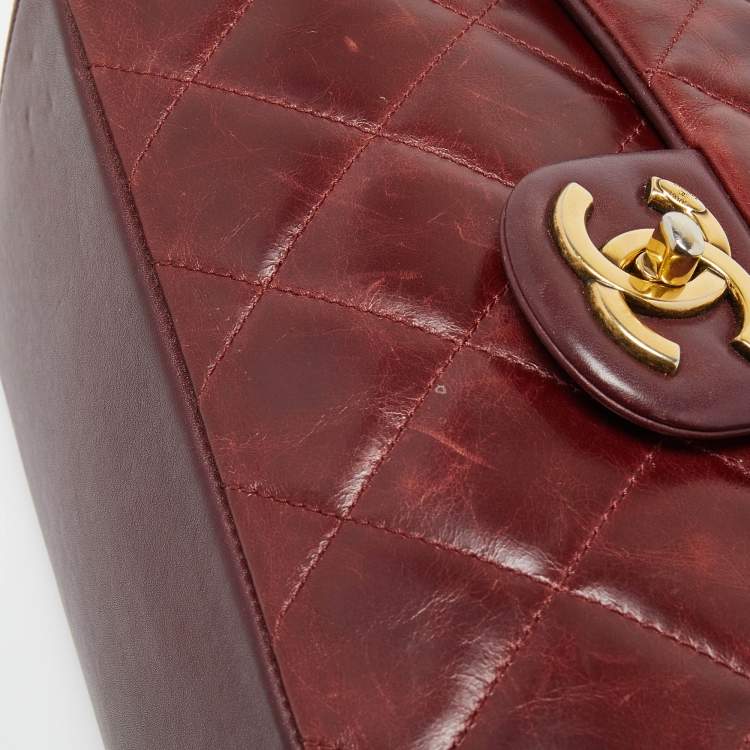 Pre Owned Chanel Burgundy Aged Leather Gold Bar Top Handle Bag
