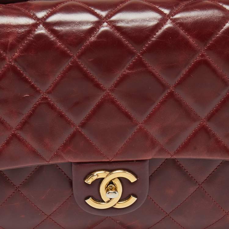 Pre Owned Chanel Burgundy Aged Leather Gold Bar Top Handle Bag