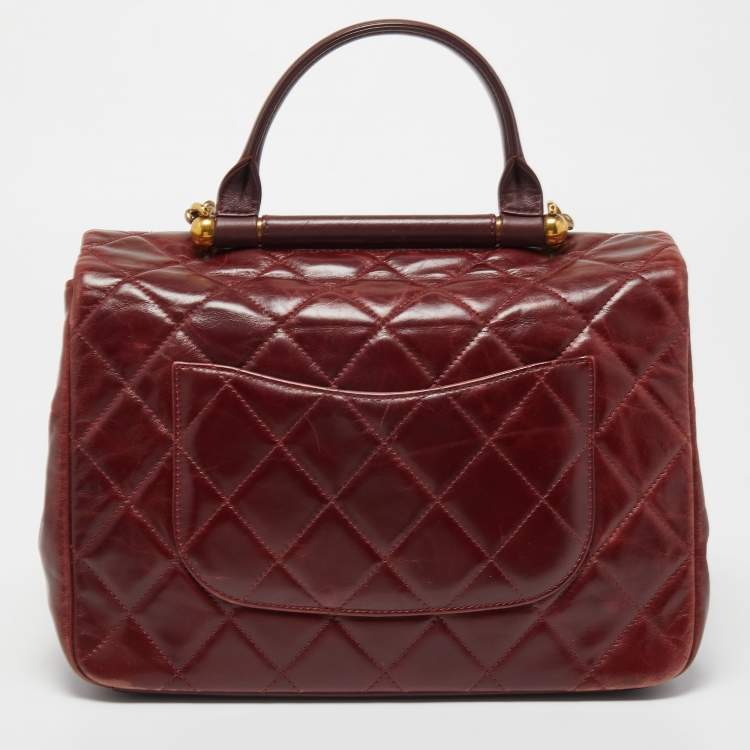 Pre Owned Chanel Burgundy Aged Leather Gold Bar Top Handle Bag