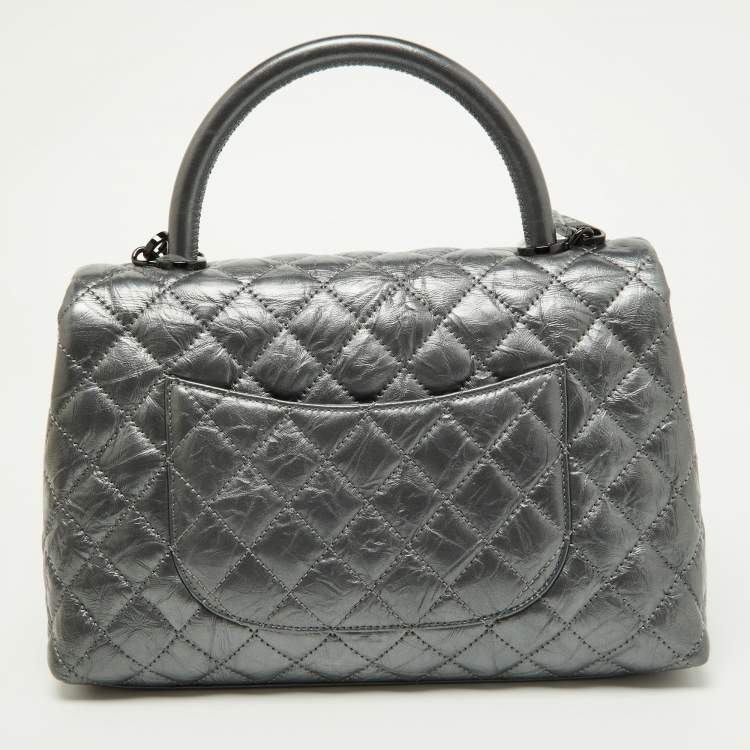 Pre Owned Chanel Metallic Grey Leather Medium Coco Top Handle Bag
