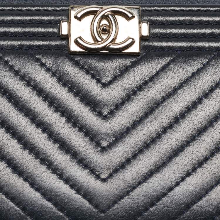 Pre Owned Chanel Dark Blue Chevron Leather Boy Zip Around Wallet