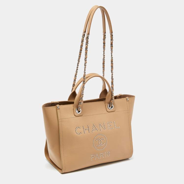 Pre Owned Chanel Beige Caviar Leather Medium Studded Logo Deauville Tote 