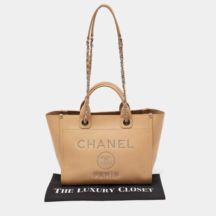 Pre Owned Chanel Beige Caviar Leather Medium Studded Logo Deauville Tote 