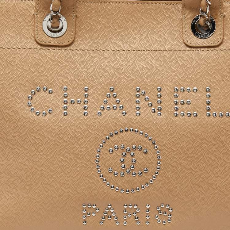 Pre Owned Chanel Beige Caviar Leather Medium Studded Logo Deauville Tote 