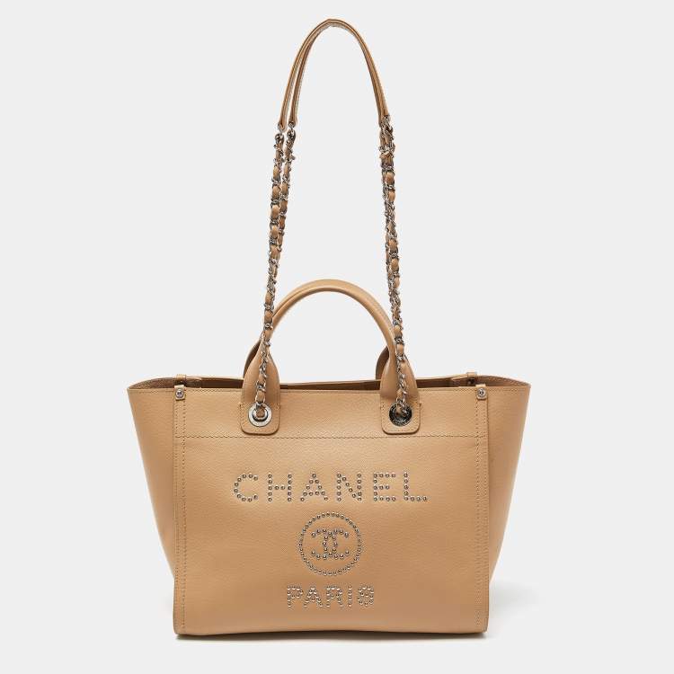 Pre Owned Chanel Beige Caviar Leather Medium Studded Logo Deauville Tote 