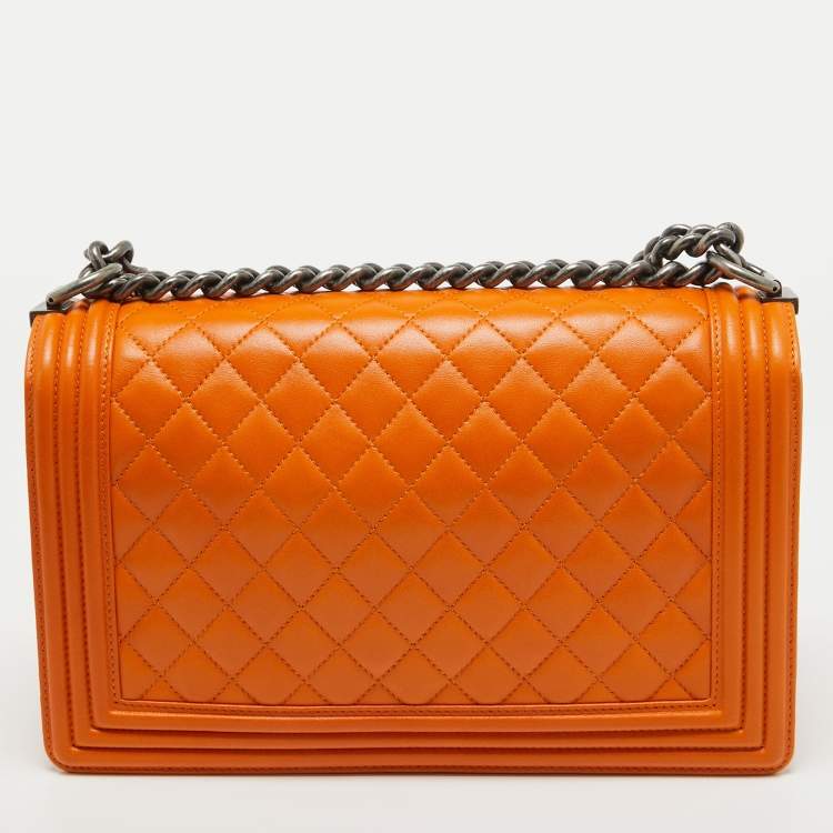 مملوكة مسبقًا Chanel Orange Quilted Leather New Medium Boy Bag