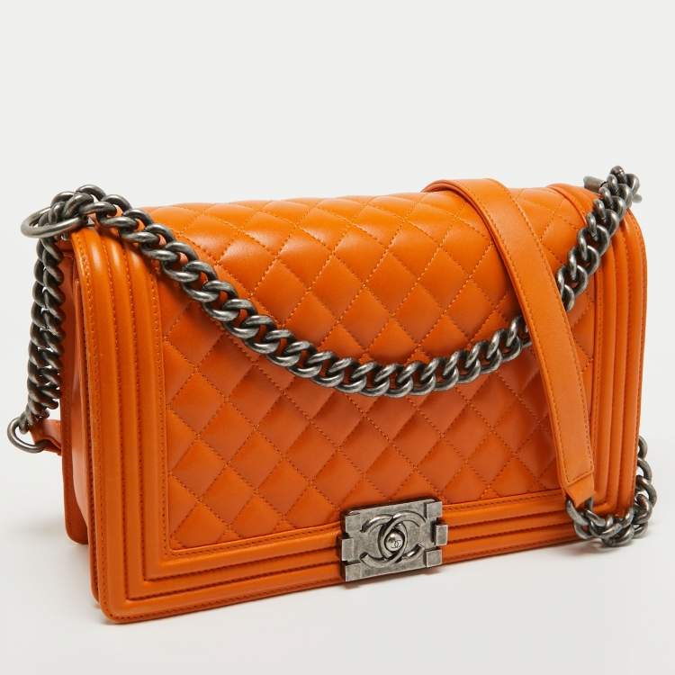 مملوكة مسبقًا Chanel Orange Quilted Leather New Medium Boy Bag