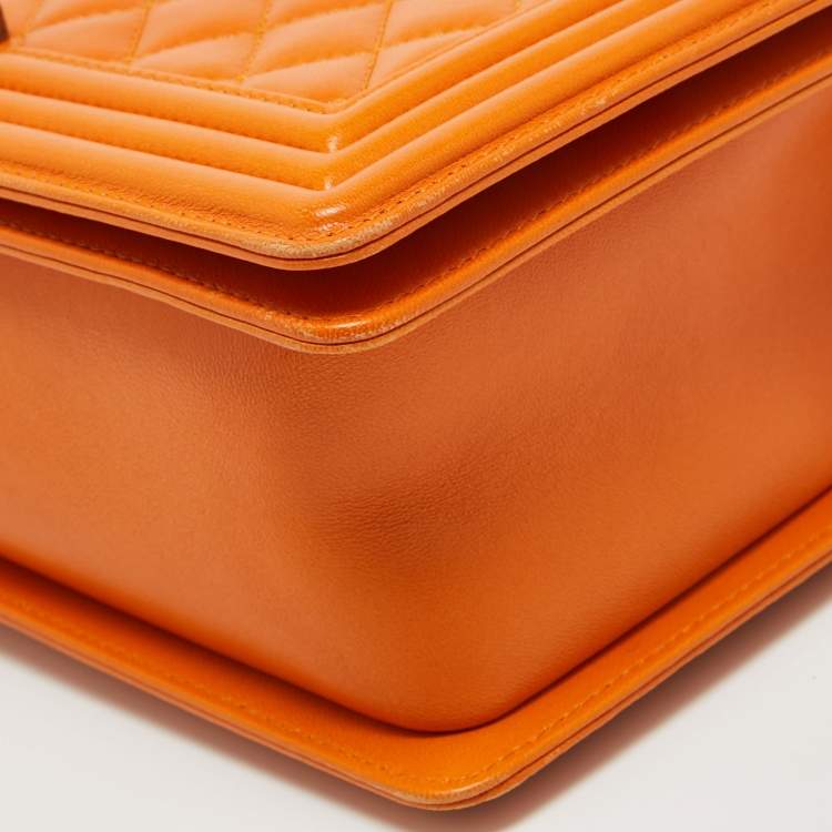 مملوكة مسبقًا Chanel Orange Quilted Leather New Medium Boy Bag