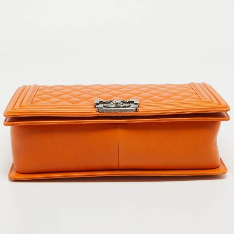 مملوكة مسبقًا Chanel Orange Quilted Leather New Medium Boy Bag