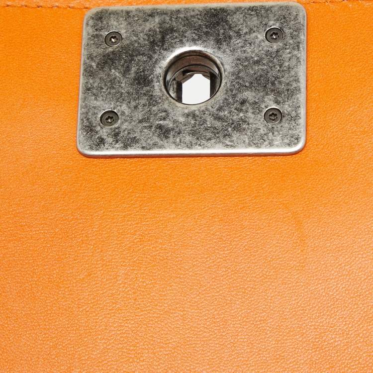 مملوكة مسبقًا Chanel Orange Quilted Leather New Medium Boy Bag