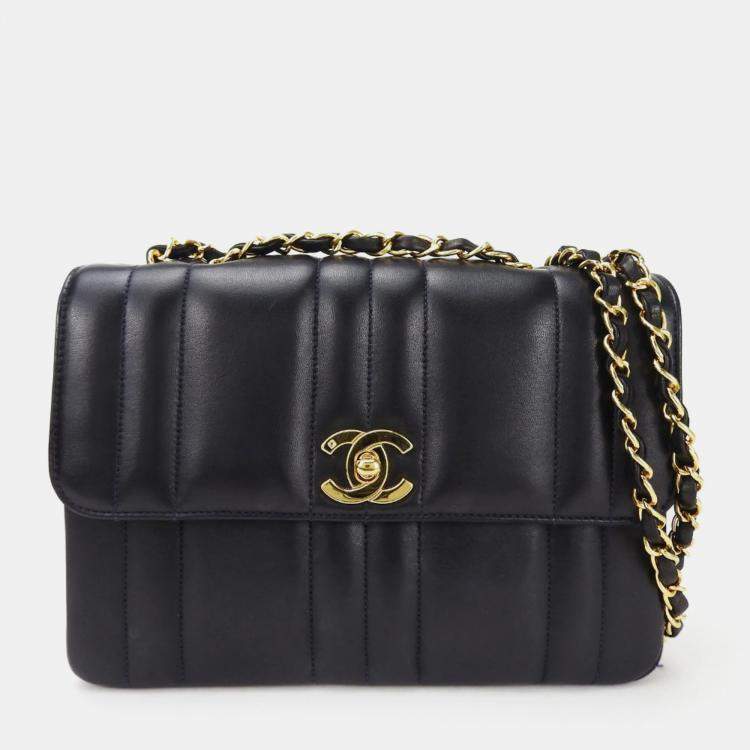 Chanel vertical quilted bag on sale