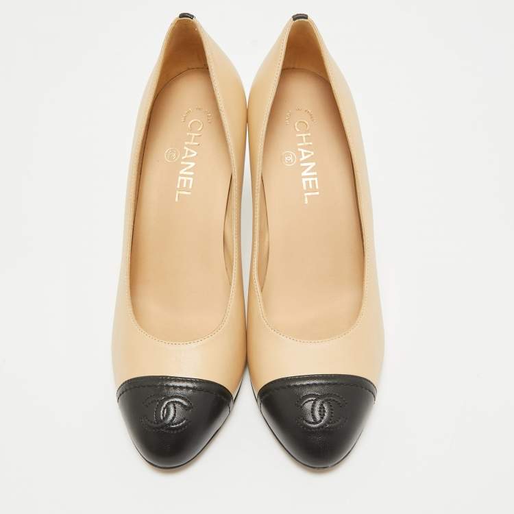 Pre Owned Chanel Beige/Black Leather Cap Toe Pumps Size 39.5