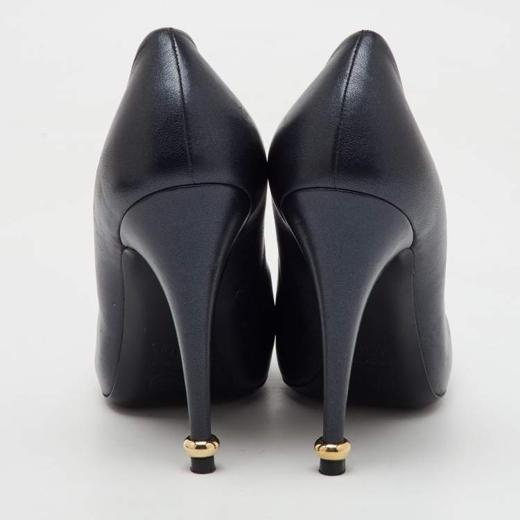 Pre Owned Chanel Black/Gold Leather CC Camelia Round Toe Pumps Size 37.5