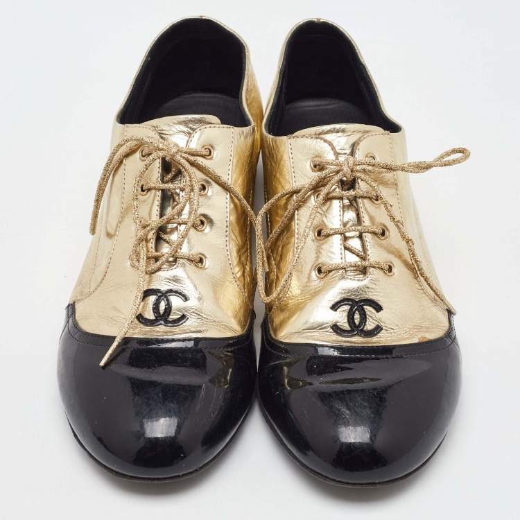 Pre Owned Chanel Gold/Black Leather and Patent Leather CC Lace Up Oxfords Size 38.5
