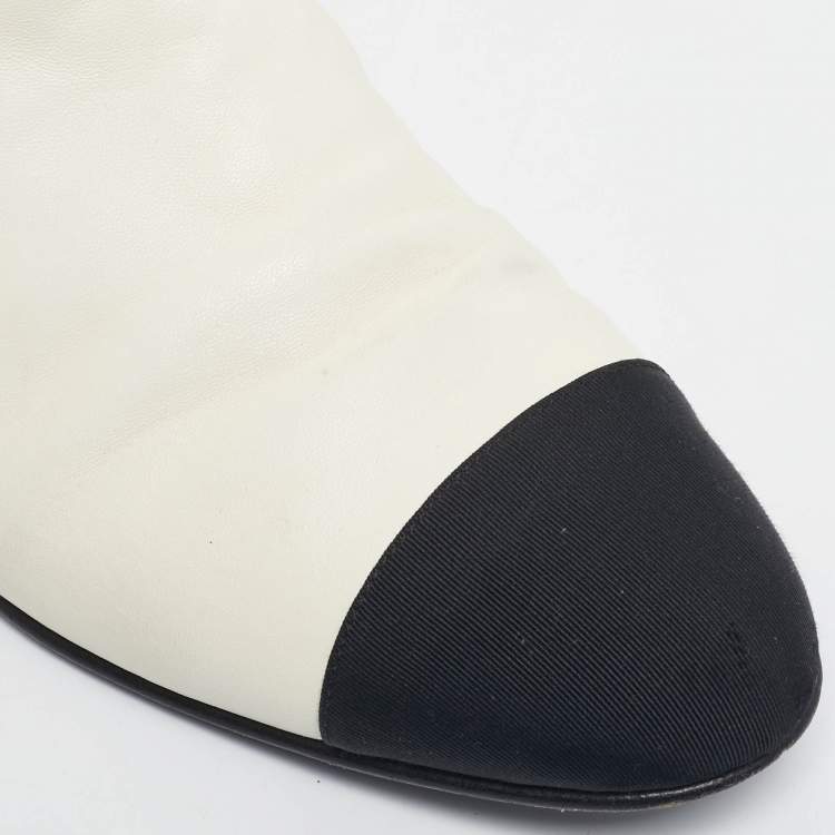 Pre Owned Chanel Ivory/Black Leather Logo Cap Toe Ankle Length Boots Size 38.5