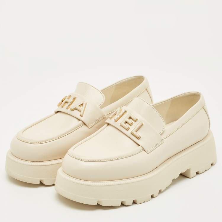 Pre Owned Chanel Cream Leather Logo Slip On Loafers Size 36.5
