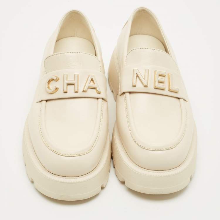 Pre Owned Chanel Cream Leather Logo Slip On Loafers Size 36.5