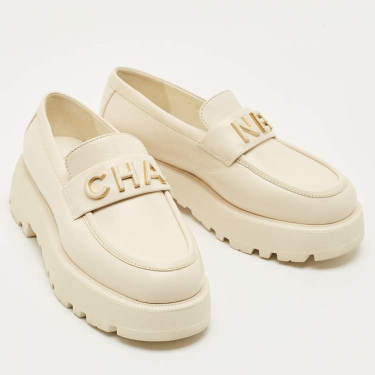 Pre Owned Chanel Cream Leather Logo Slip On Loafers Size 36.5