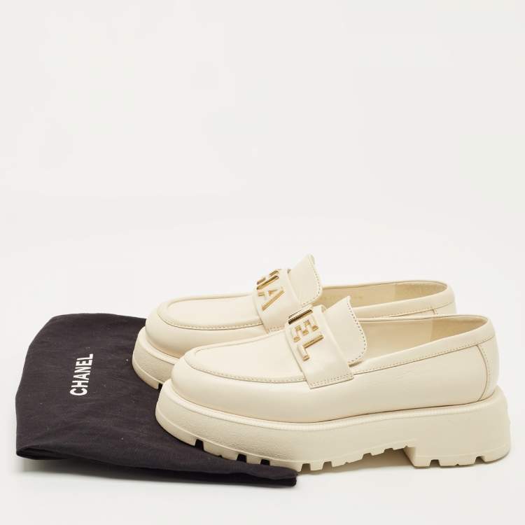 Pre Owned Chanel Cream Leather Logo Slip On Loafers Size 36.5