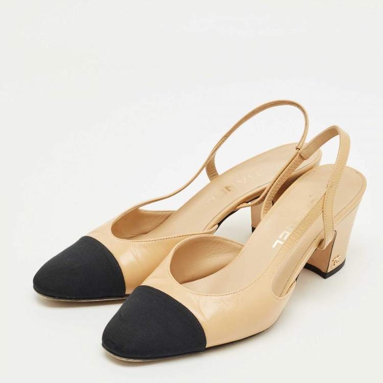 Pre Owned Chanel Cream/Black Canvas and Leather CC Slingback Pumps Size 37.5