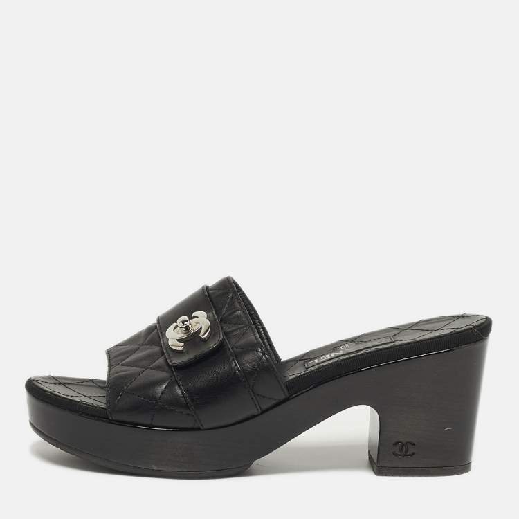 Pre Owned Chanel  Size 37.5 Black Quilted Leather CC Turn Lock Platform Slide Sandals