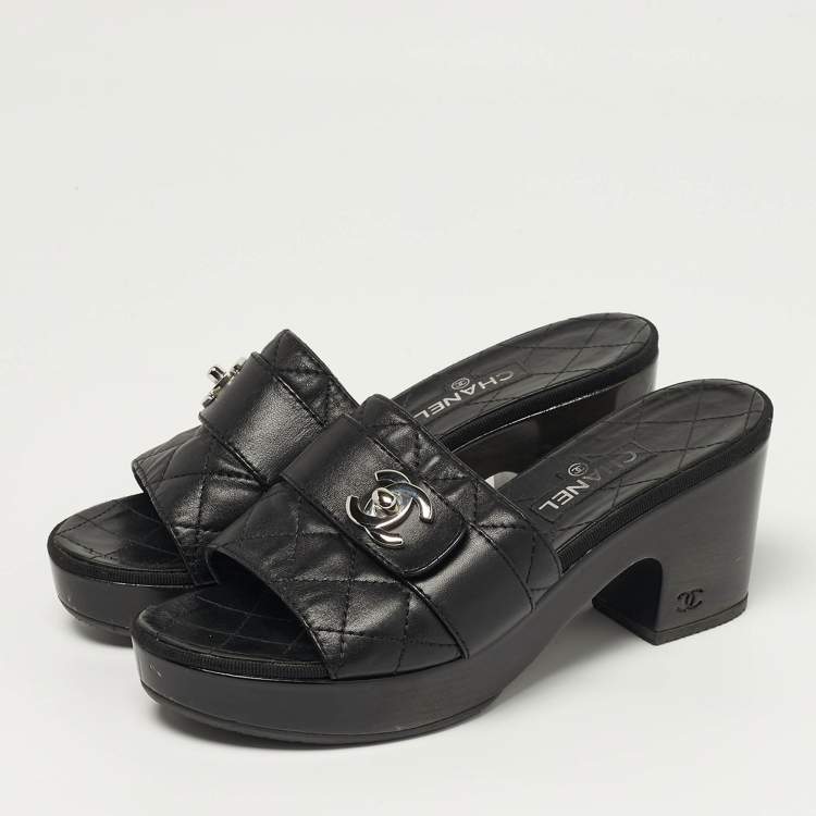 Pre Owned Chanel  Size 37.5 Black Quilted Leather CC Turn Lock Platform Slide Sandals