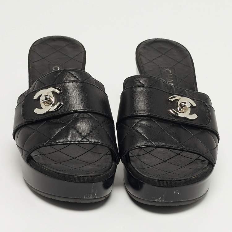 Pre Owned Chanel  Size 37.5 Black Quilted Leather CC Turn Lock Platform Slide Sandals