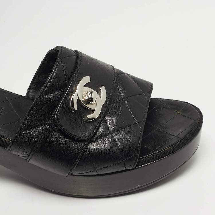 Pre Owned Chanel  Size 37.5 Black Quilted Leather CC Turn Lock Platform Slide Sandals