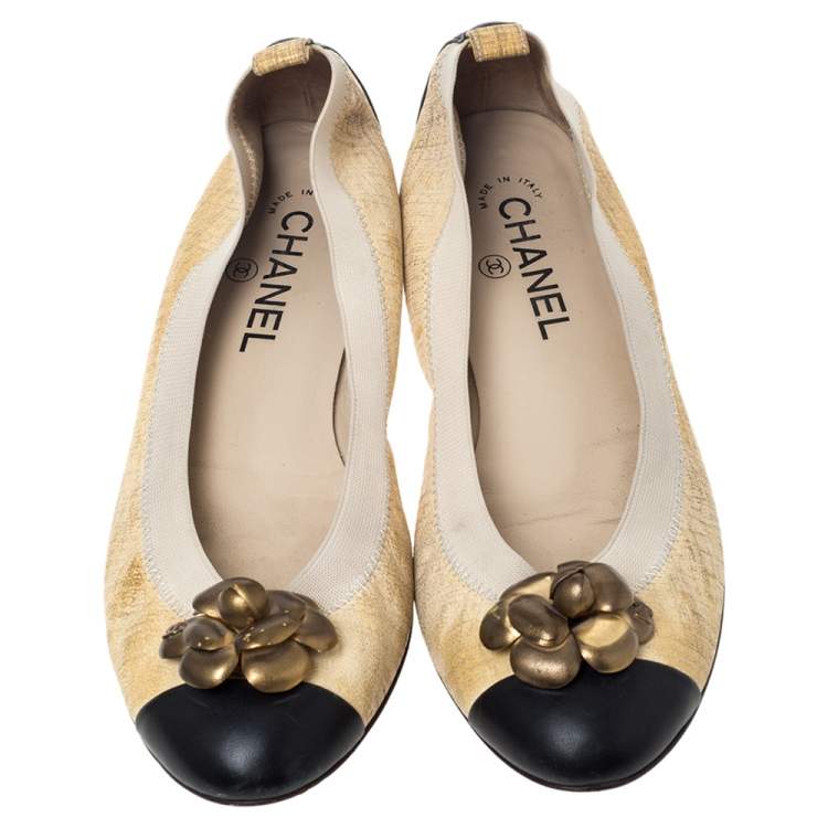 cream and black flats