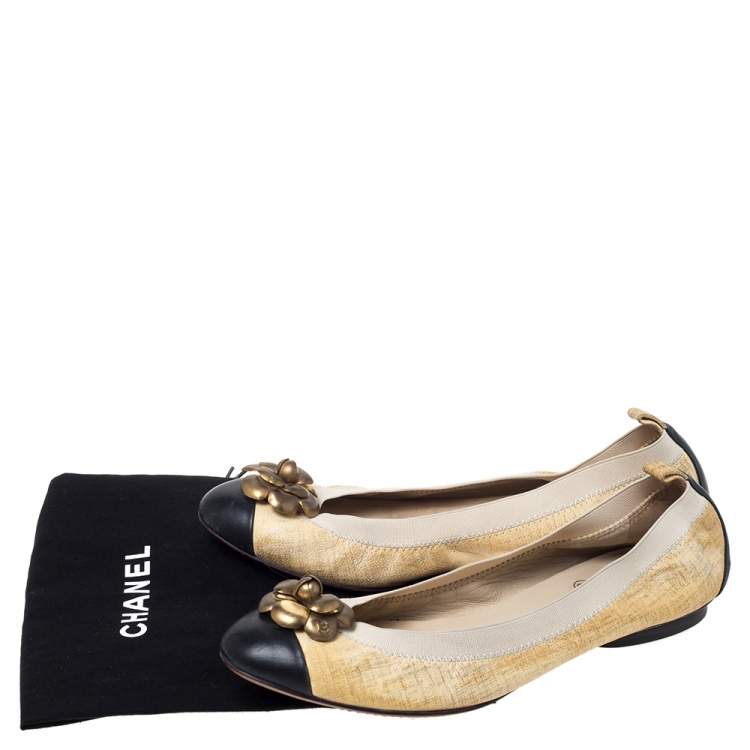 cream and black flats