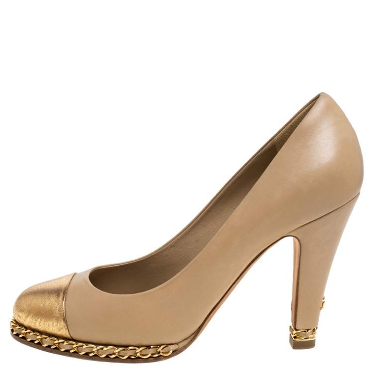 Chanel CC Gold-Tipped Heel Cap Toe Pumps