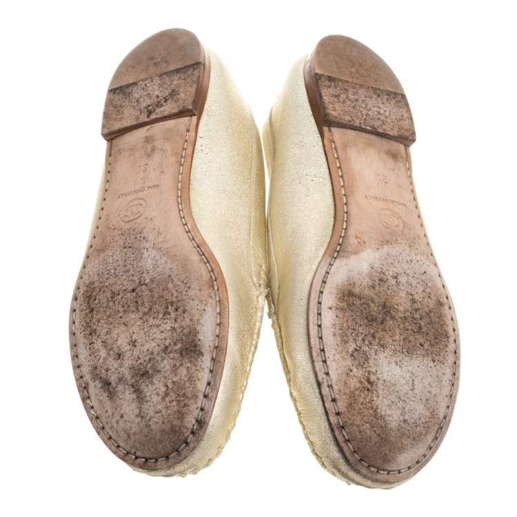 Pre Owned Chanel Shimmery Gold Leather CC Loafers Size 38