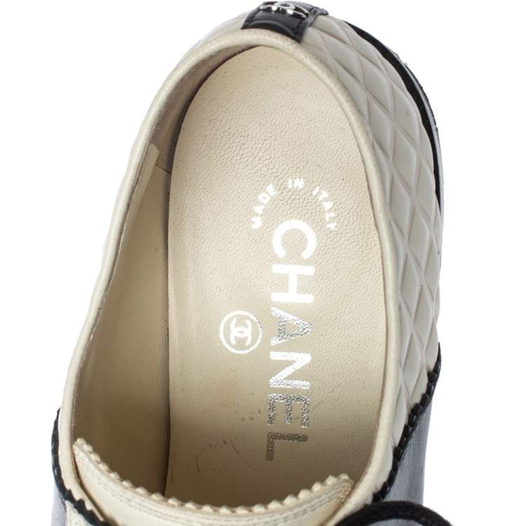 Pre Owned Chanel White/Black Quilted Leather Lace Up Sneakers Size 38