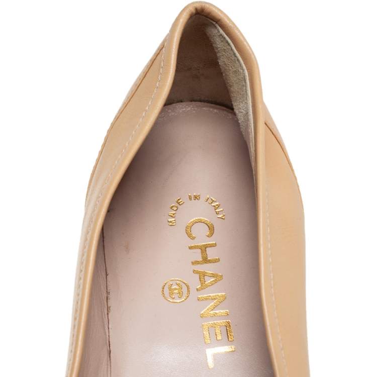 Pre Owned Chanel Beige Leather CC Slip on Loafers Size 41