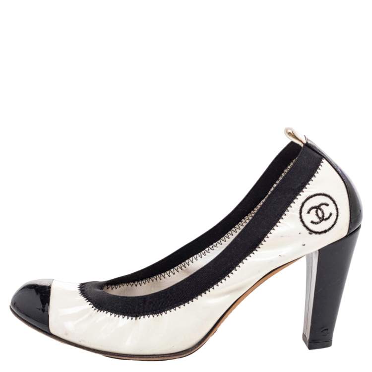 Chanel black and hot sale white pumps