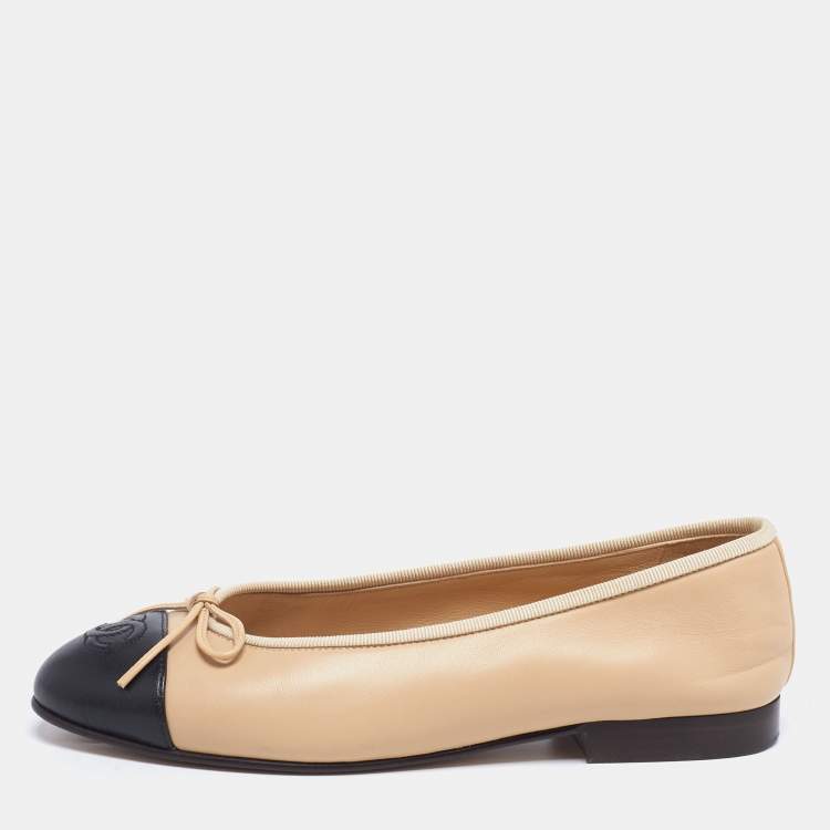 beige black cap toe flats